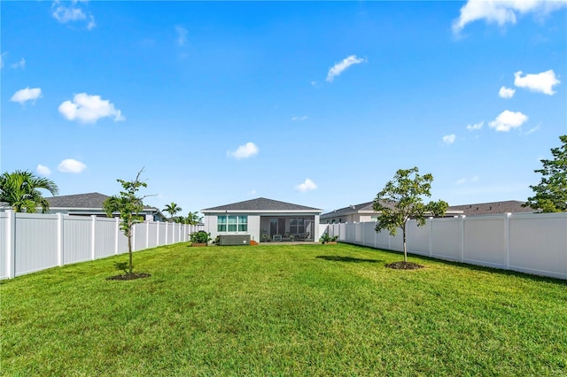 view of yard featuring a sunroom