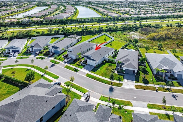 drone / aerial view featuring a water view