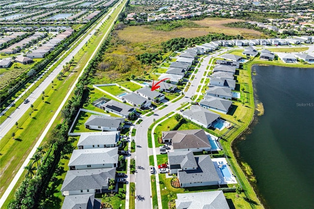 drone / aerial view with a water view