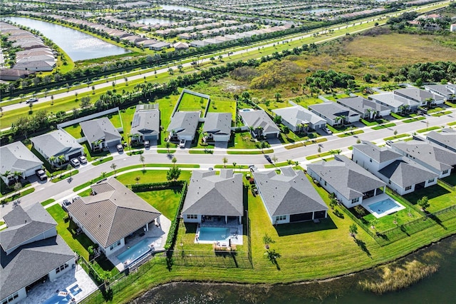 drone / aerial view featuring a water view