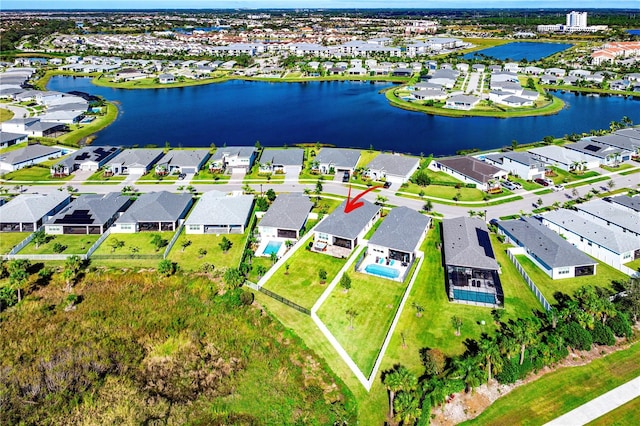 drone / aerial view featuring a water view