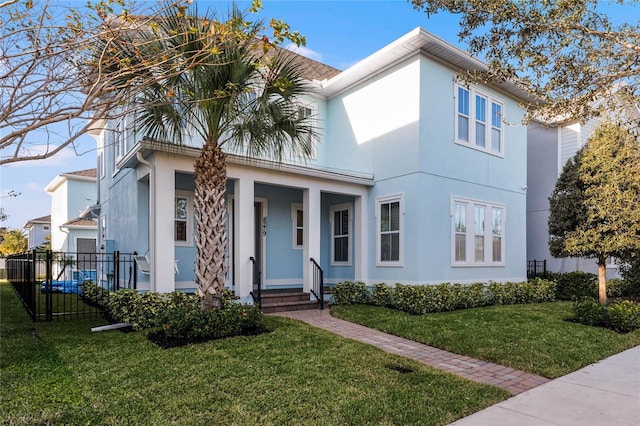 view of front of home featuring a front yard