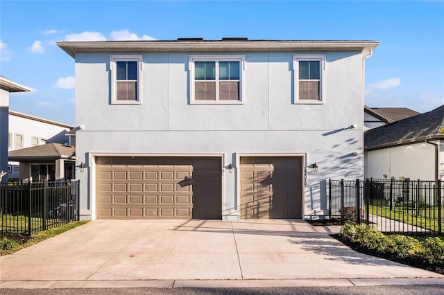 front of property with a garage