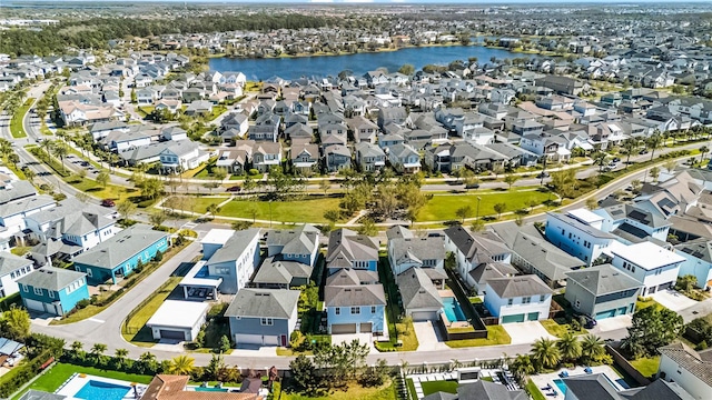 aerial view featuring a water view and a residential view