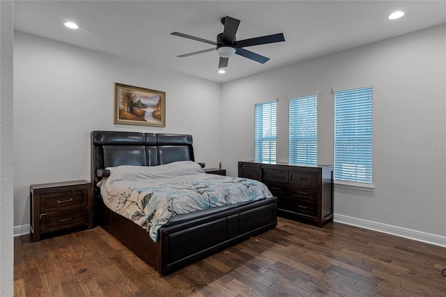 bedroom featuring dark wood-style floors, recessed lighting, ceiling fan, and baseboards