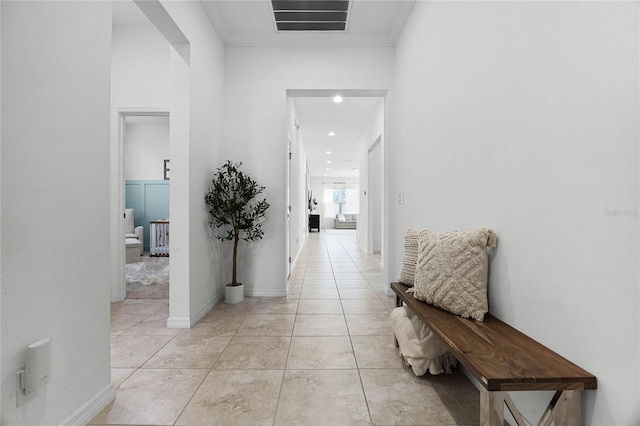 hall with light tile patterned floors