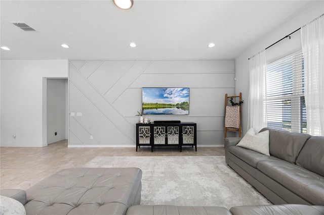 living room with a textured ceiling