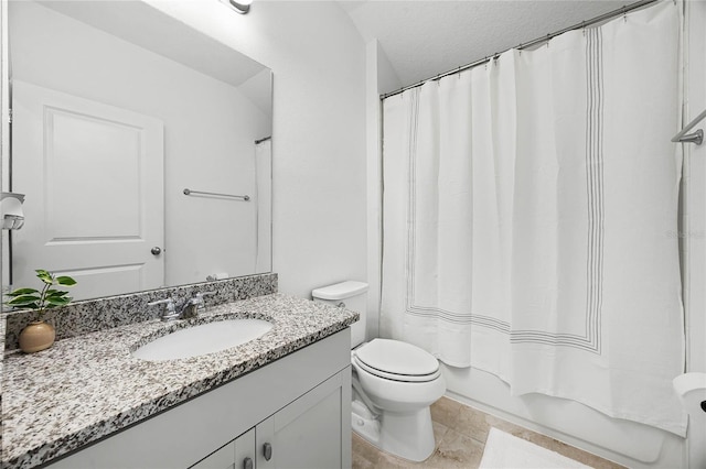 full bathroom with shower / bath combo, vanity, a textured ceiling, tile patterned flooring, and toilet