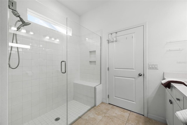 bathroom with vanity, tile patterned floors, and an enclosed shower