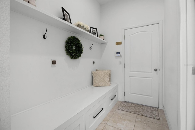 mudroom featuring light tile patterned flooring