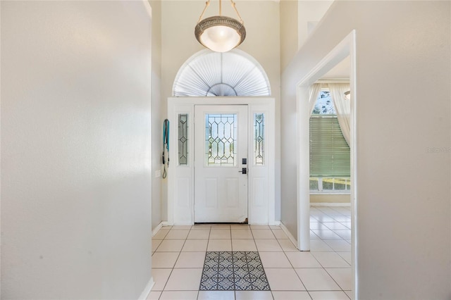 foyer entrance featuring light tile patterned floors