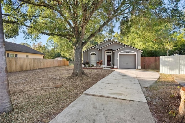 view of front of property with a garage