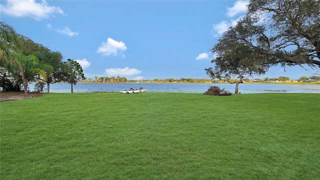 view of yard with a water view