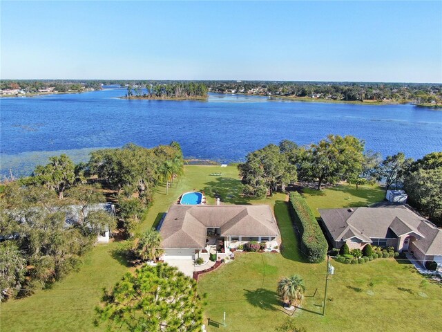 drone / aerial view with a water view