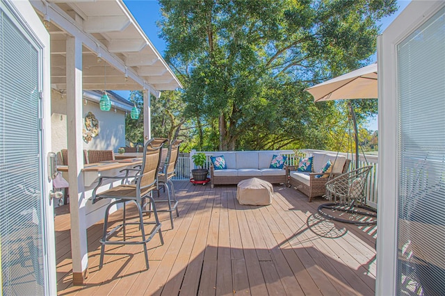 deck featuring an outdoor living space