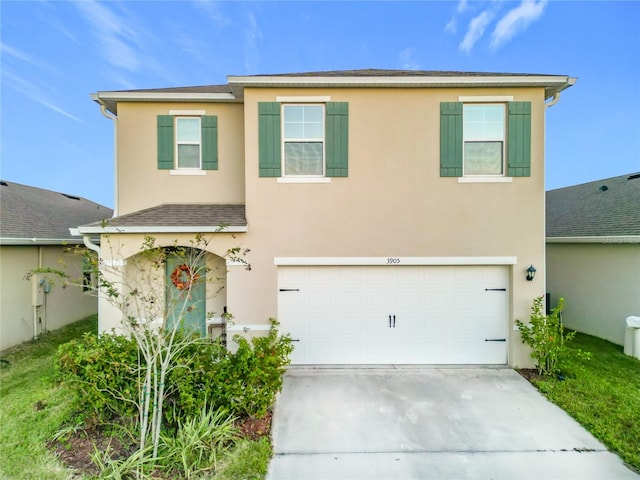 view of front of property with a garage