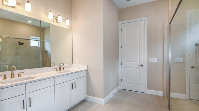 bathroom with vanity and an enclosed shower