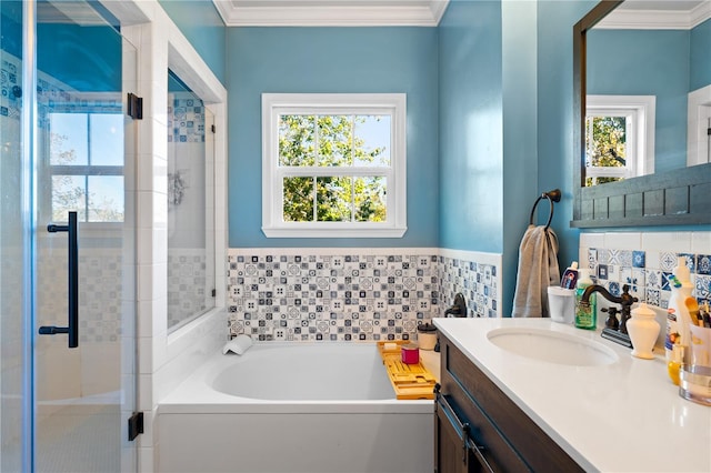 bathroom featuring vanity, separate shower and tub, a wealth of natural light, and crown molding