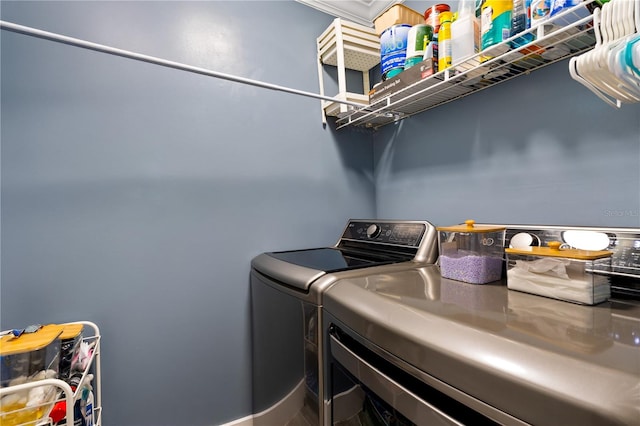 washroom featuring washer and dryer