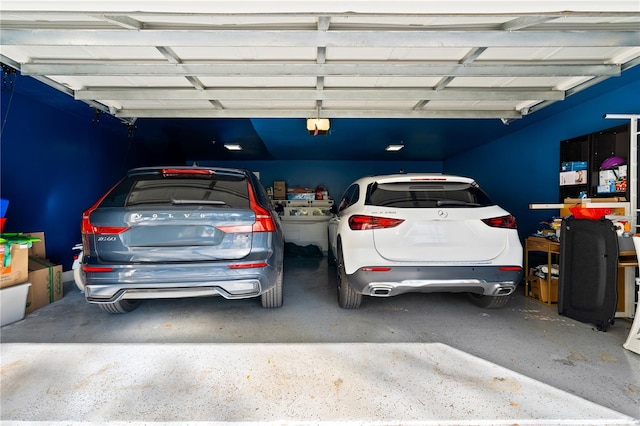 garage featuring a garage door opener