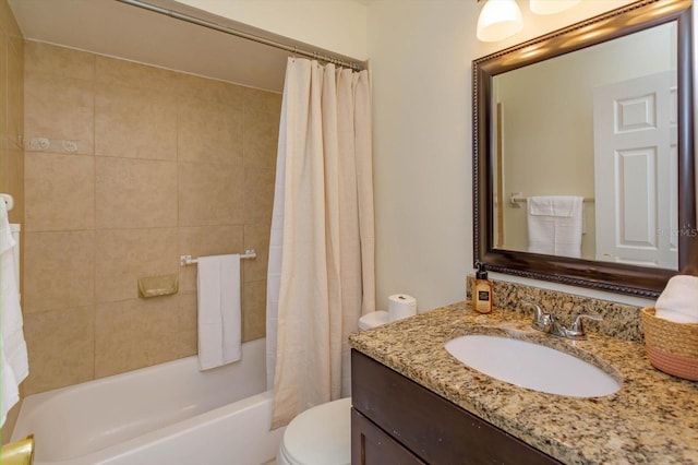 full bathroom with vanity, toilet, and shower / bath combo with shower curtain