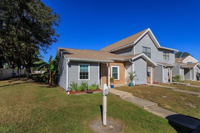 view of front facade with a front lawn