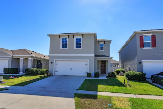 view of front property with a front yard and a garage