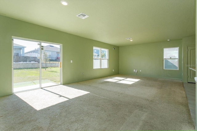 interior space featuring light carpet