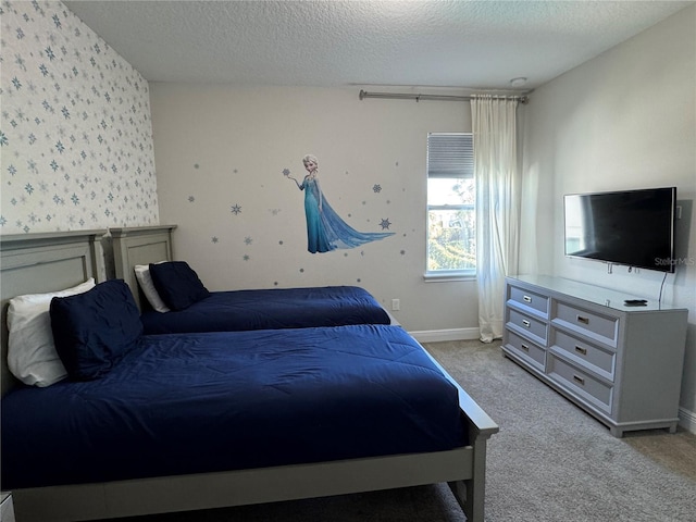 carpeted bedroom with a textured ceiling