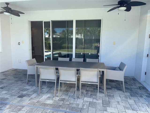 view of patio with ceiling fan