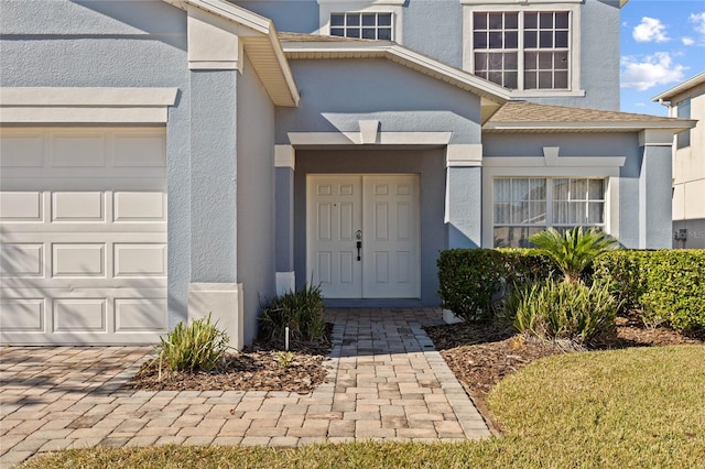 property entrance featuring a garage