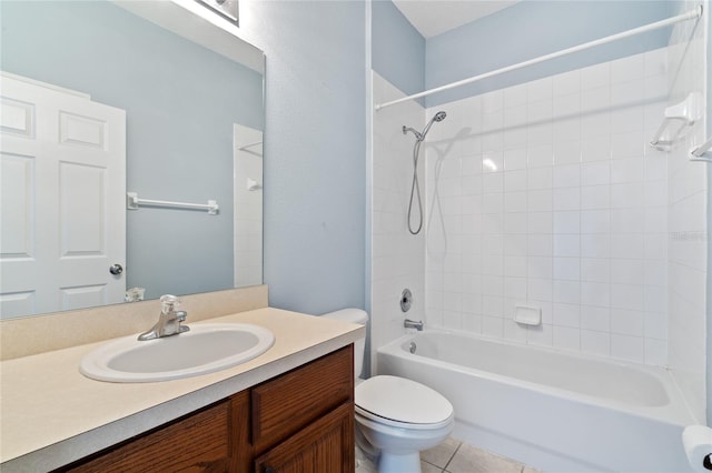 full bathroom with tile patterned flooring, vanity, toilet, and tiled shower / bath combo