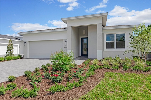 view of front of property with a garage