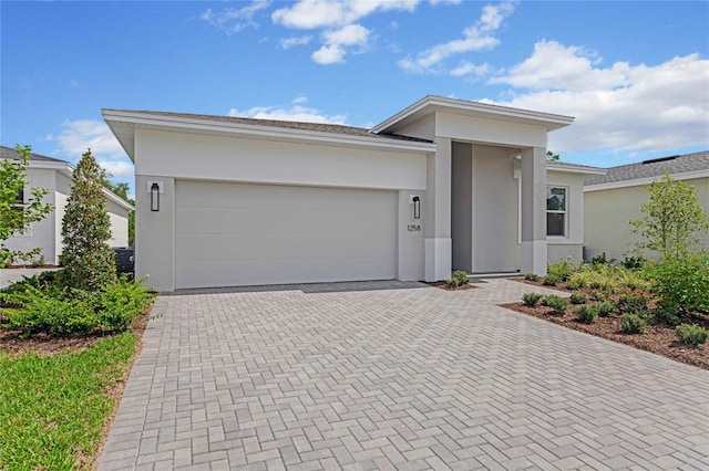 view of front of property featuring a garage