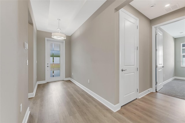 entrance foyer featuring light wood-type flooring