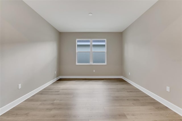 unfurnished room featuring light wood-type flooring