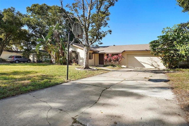 view of front of property with a front lawn and a garage