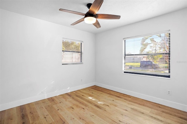 1621 Puritan, Winter Park, FL 32792 - unfurnished room featuring baseboards, wood finished floors, and ceiling fan