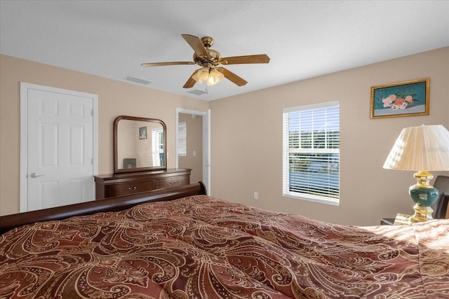 bedroom featuring ceiling fan