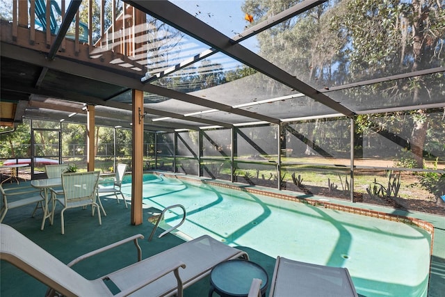 view of pool with a lanai