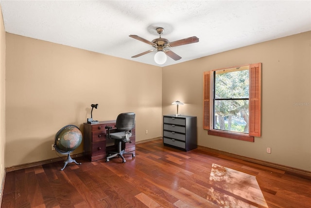 home office featuring hardwood / wood-style floors and ceiling fan