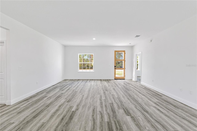 empty room with light wood-type flooring