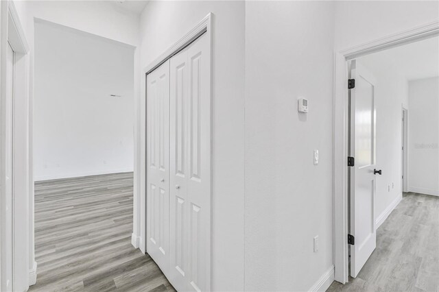 hallway featuring light hardwood / wood-style floors