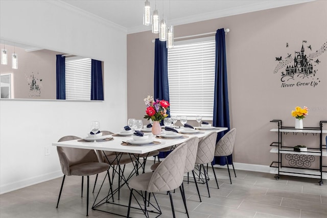 dining room with crown molding