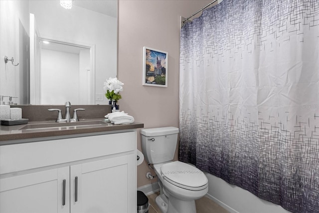 full bathroom featuring vanity, shower / bath combination with curtain, and toilet