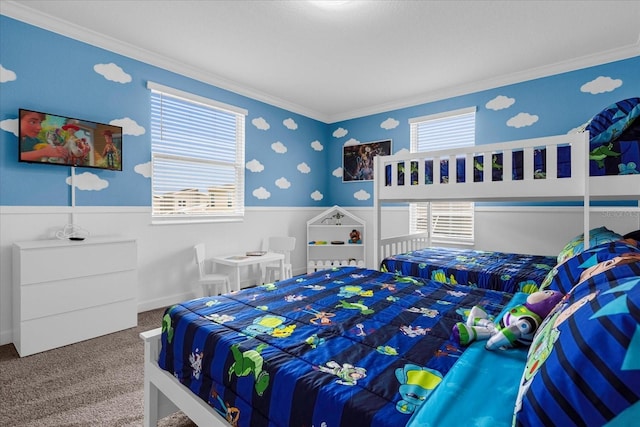 carpeted bedroom featuring crown molding