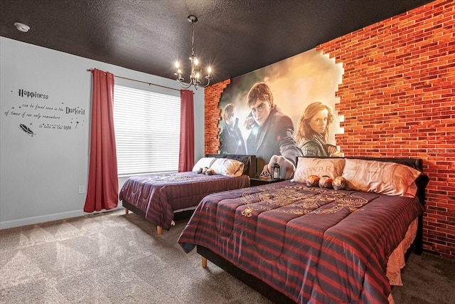 carpeted bedroom featuring a chandelier, a textured ceiling, and brick wall