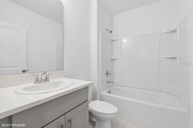 full bathroom with tile patterned floors, vanity, toilet, and tub / shower combination