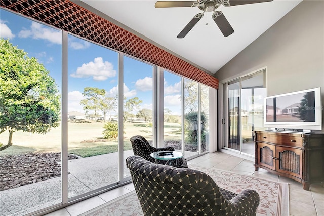 sunroom / solarium with ceiling fan and vaulted ceiling