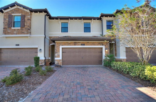 view of front of property with a garage